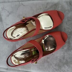 Coach Wedge shoes.  Peach color. Size 8.5. Gentle used. Gold hardware. Comfy.
